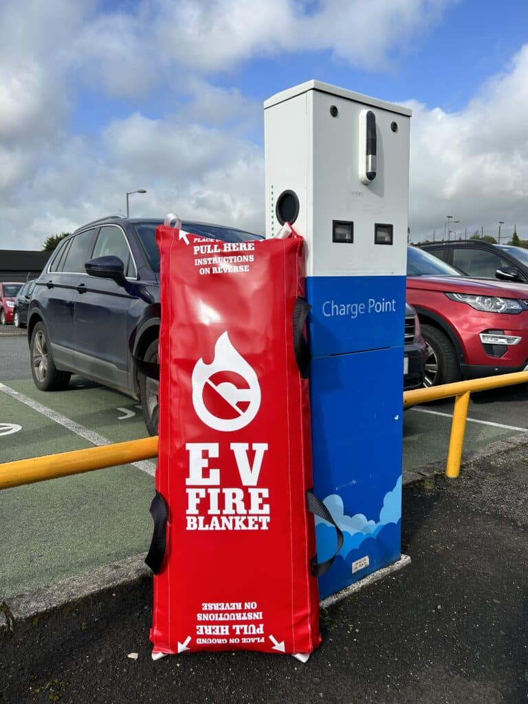 Cunninghams EV Fire Blanket beside EV Charging Point